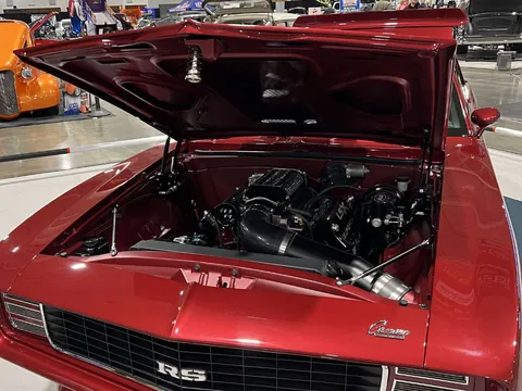 Supercharged LSX engine bay under the Camaro hood
